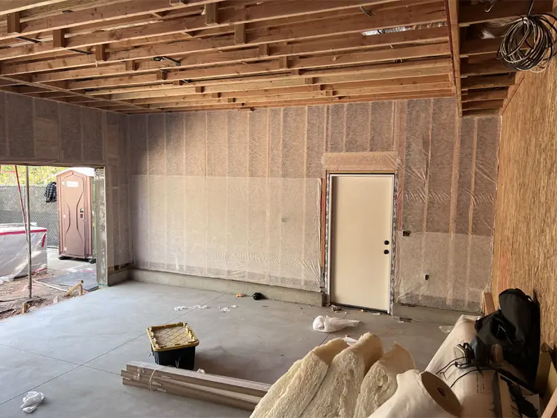 Garage walls with new insulation installed