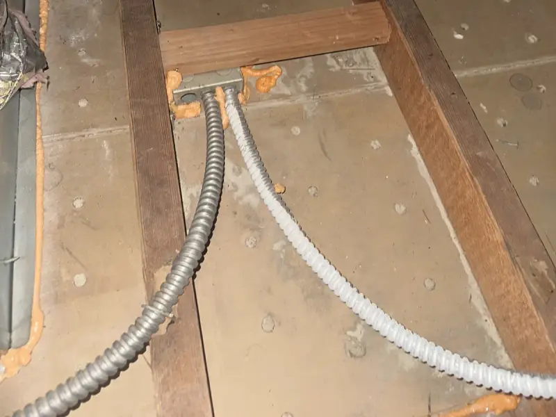 Attic floor cleared down to the drywall