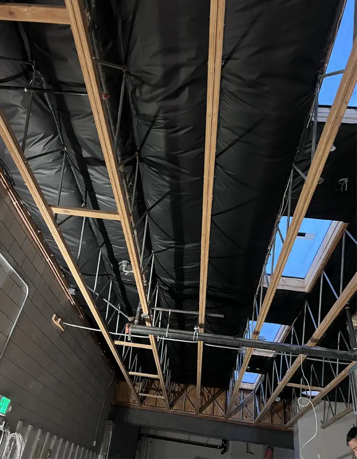Insulated commercial ceiling with skylights