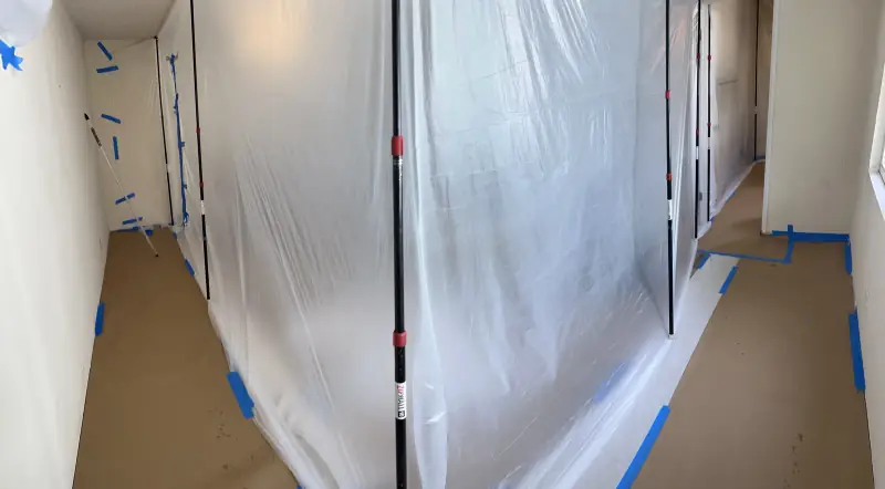 Plastic containment set up inside a home