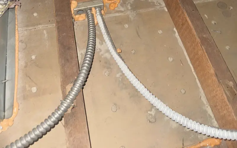 Sealed attic penetrations around wiring