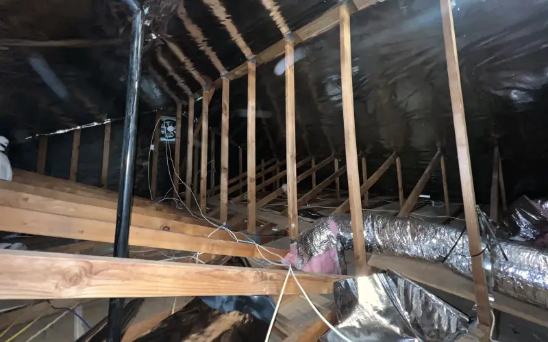 Radiant barrier installed on attic rafters